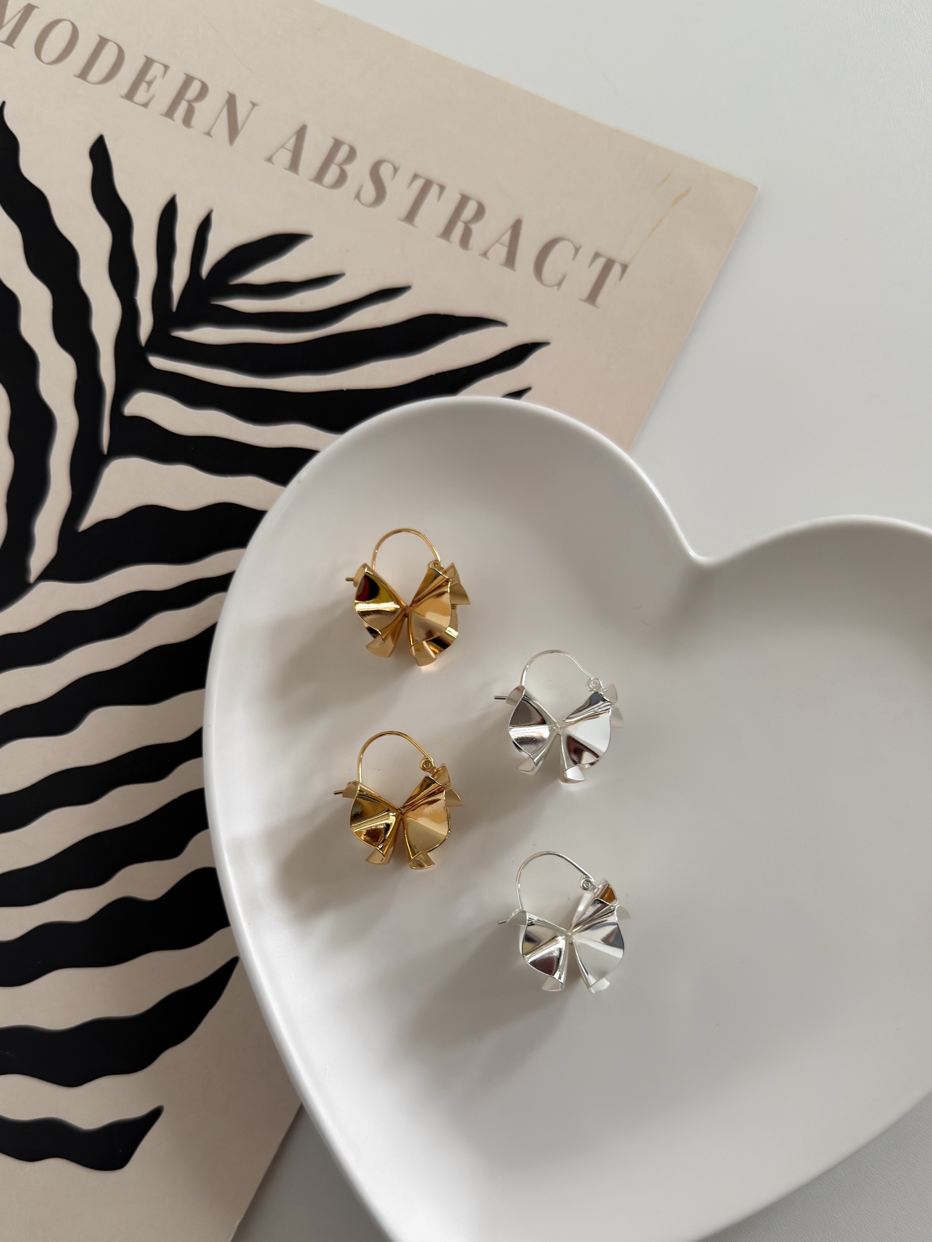 Серьги бантики